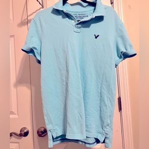 Teal blue polo shirt